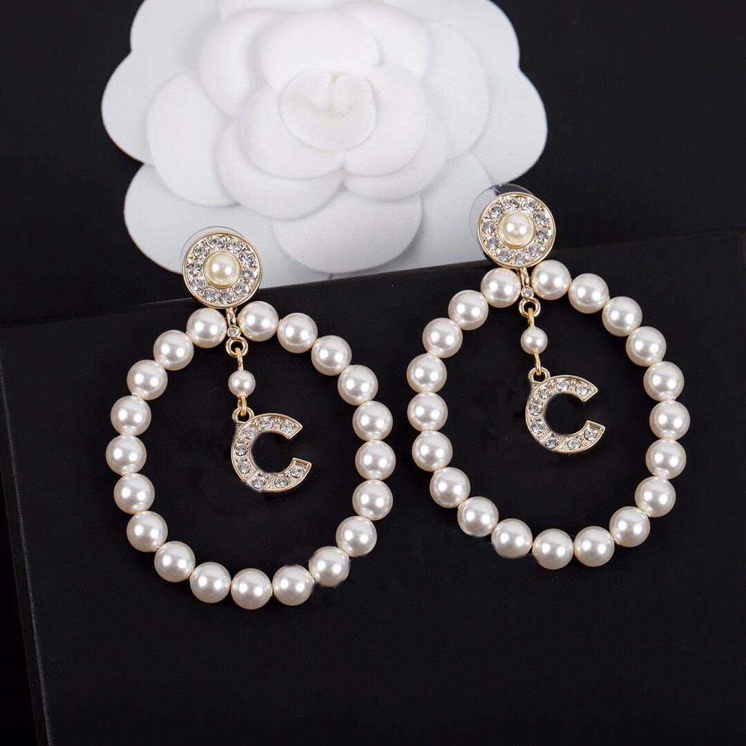 2022 Top quality Charm dangle drop earring with diamond and pearl beads for women wedding jewelry gift have box stamp PS7065
2022 Top quality Charm dangle drop earring with diamond and pearl beads for women wedding jewelry gift have box stamp PS7065