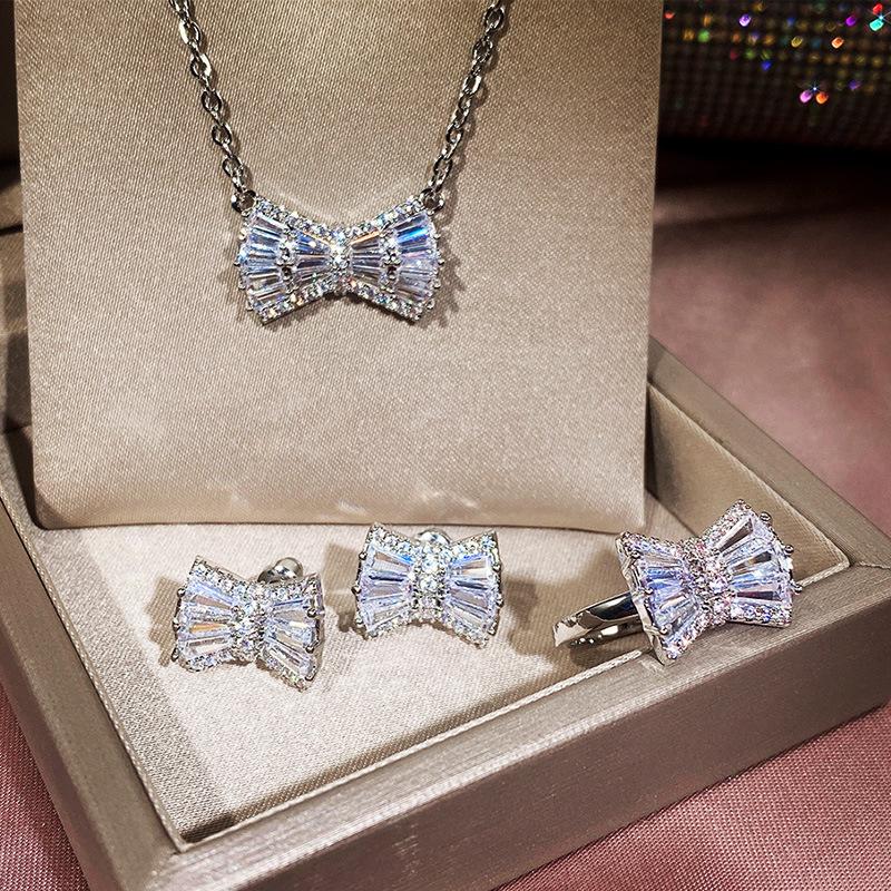 Earrings & Necklace Korean Simple Bowknot Jewelry Set Platinum Plated Zircon Ring Fashion Women's Wedding Accessories Wholesale, Silver 
Earrings & Necklace Korean Simple Bowknot Jewelry Set Platinum Plated Zircon Ring Fashion Women's Wedding Accessories Wholesale, Silver