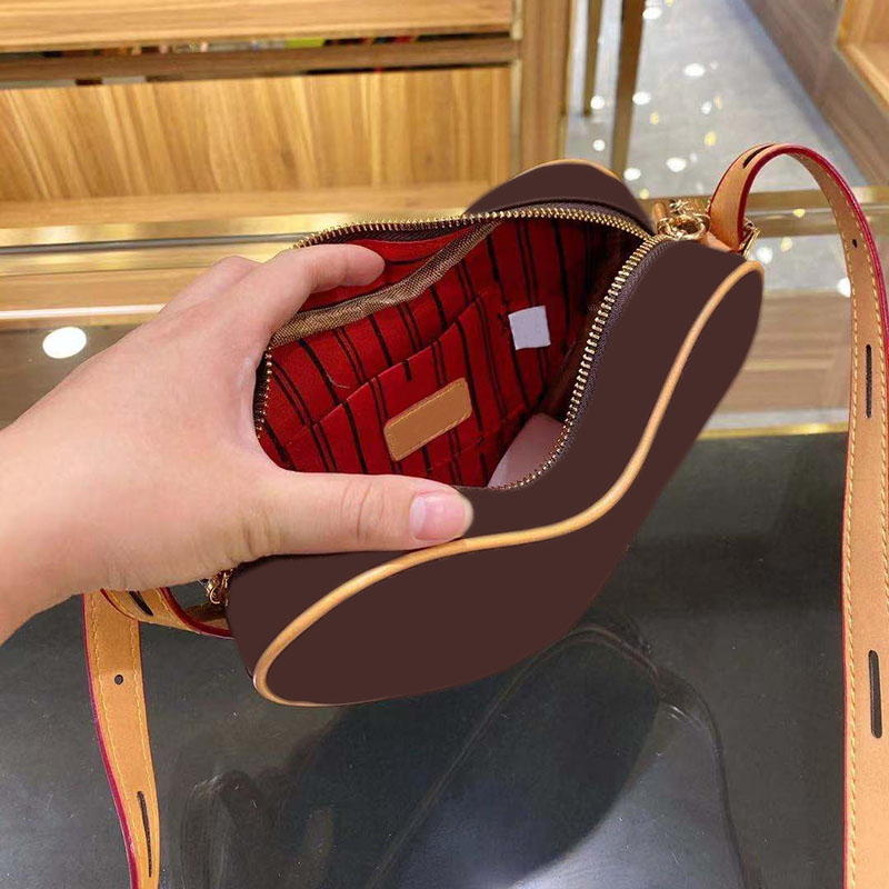 Female fashion letter pattern single shoulder crossbody bag heart-shaped designer bags quality PU leather 2021 best-selling classic models, Brown
Female fashion letter pattern single shoulder crossbody bag heart-shaped designer bags quality PU leather 2021 best-selling classic models, Brown