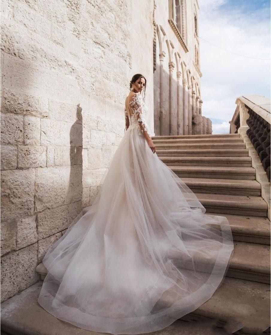2021 Sexy Long Sleeves Lace Mermaid Wedding Dresses Bridal Gowns Champagne With Detachable Skirt Overskirts Tulle Applique Sweep Train robes de mariée