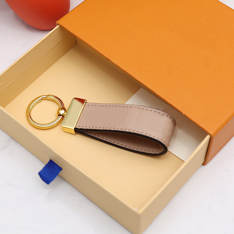 Women Fashion Keychain Designer Handmade Leather Lovers Key Chains Letter Flower Mens Car Keychains Womens Classic Hanging Rope ACC
Women Fashion Keychain Designer Handmade Leather Lovers Key Chains Letter Flower Mens Car Keychains Womens Classic Hanging Rope ACC