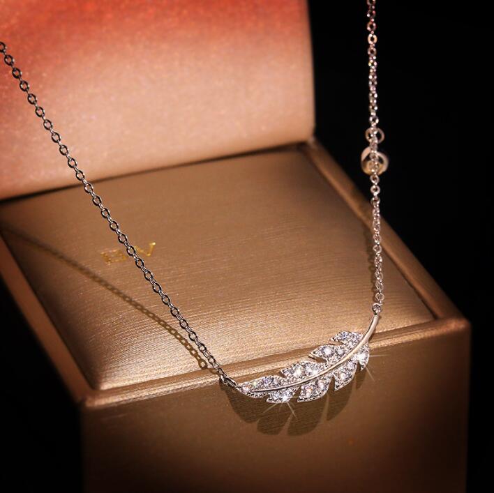 Sterling Sier Feather Necklace - Delicate Pendant with White Sapphire CZ Accents, Perfect for Party & Wedding Free shipping