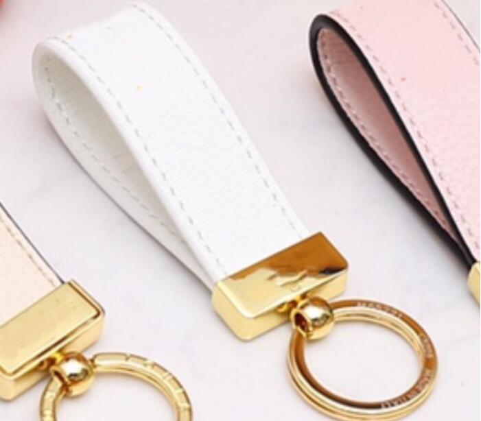 Maxi Dragonne Key chain Buckle lovers Car Keychain Handmade Leather Designers Keychains Men Women Bag Pendant Accessories 17 Color With original box
Maxi Dragonne Key chain Buckle lovers Car Keychain Handmade Leather Designers Keychains Men Women Bag Pendant Accessories 17 Color With original box