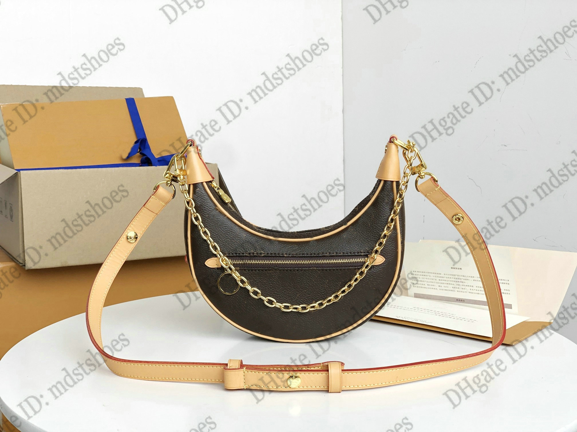 Loop Handbag Half-moon Baguette Shoulder Bags Women Designer Cruise 2022 Croissant Chain Cross Body Monograms coated canvas Leather M81098
Loop Handbag Half-moon Baguette Shoulder Bags Women Designer Cruise 2022 Croissant Chain Cross Body Monograms coated canvas Leather M81098