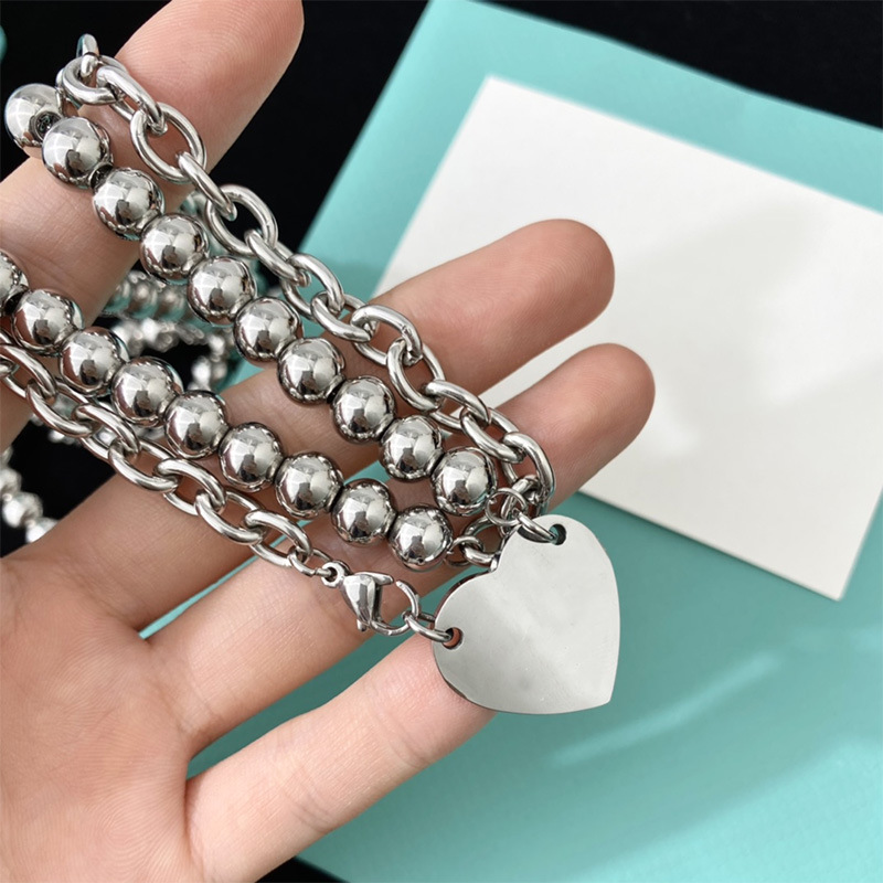 Stainless steel punk style T home beads thick chain heart hanging necklace love double circle stacked titanium non-fading
Stainless steel punk style T home beads thick chain heart hanging necklace love double circle stacked titanium non-fading