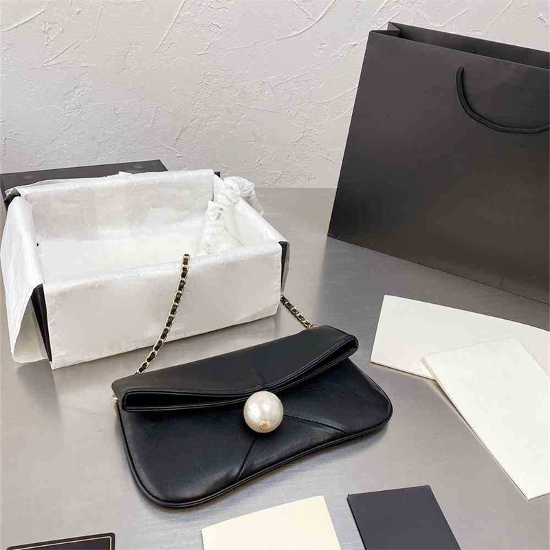 Women Luxurys Designers Bags 2021 Shop Purchase Small fragrance treasure middle big pearl chain V Designer Handbag Handbags Totes Crossbody Bag
Women Luxurys Designers Bags 2021 Shop Purchase Small fragrance treasure middle big pearl chain V Designer Handbag Handbags Totes Crossbody Bag
