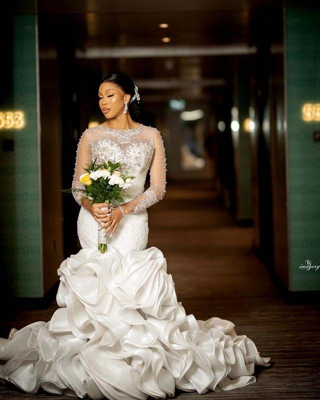 Luxury Pearls Mermaid Wedding Dresses 2022 Illusion Long Sleeve Sheer O-neck Ruffles Wave Cathedral Train African Lace-up Bridal Dress