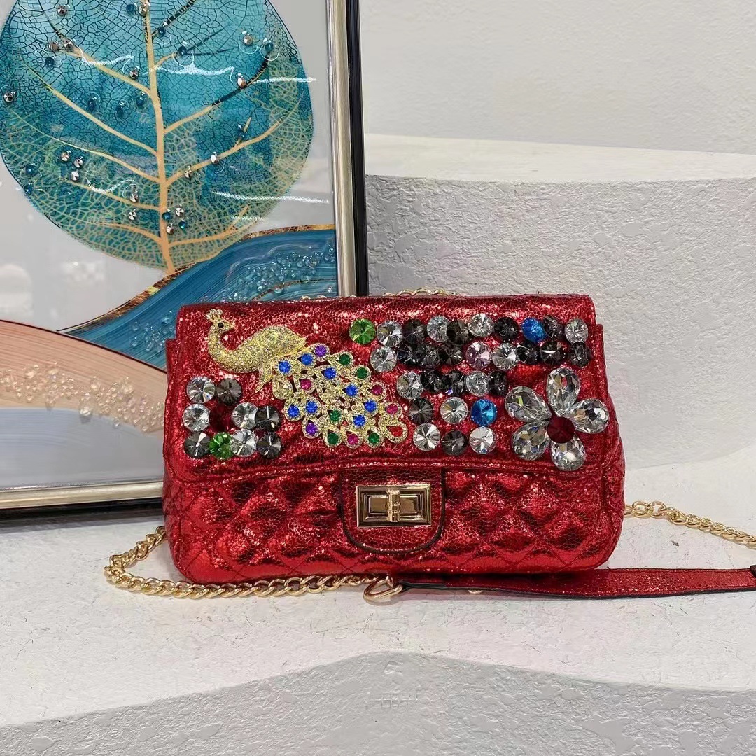 Wholesale factory ladies shoulder bags high quality soft and comfortable leather handbag European fashion Peacock diamond chain bag sweet rhinestone handbags
