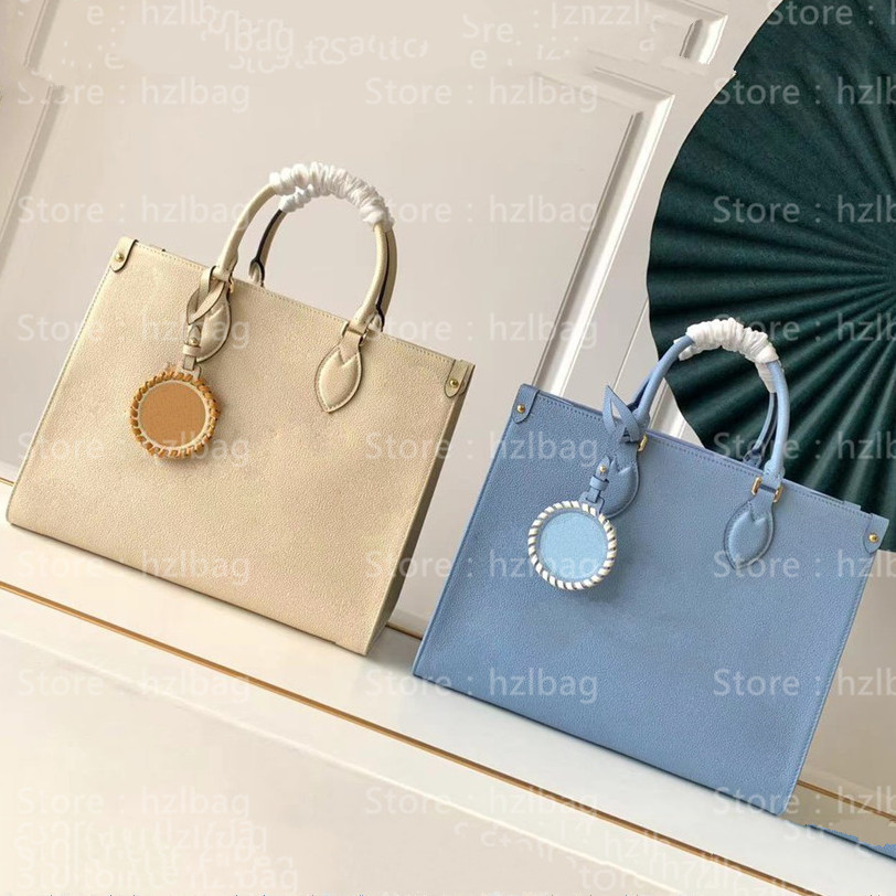 Summer Blue ONTHEGO MM tote bag color gradient embossed Monograms hand shoulder carry M45718 By The Pool women designer Bag, Color 01
Summer Blue ONTHEGO MM tote bag color gradient embossed Monograms hand shoulder carry M45718 By The Pool women designer Bag, Color 01