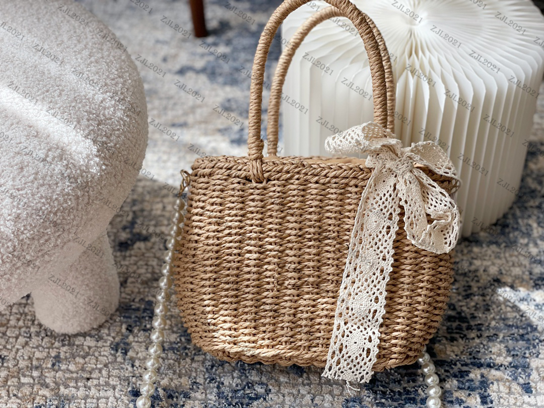 Designer handbags women's bag woven vegetable basket shoulder slung portable large-capacity pearl hand-woven straw size: 23*21cm
Designer handbags women's bag woven vegetable basket shoulder slung portable large-capacity pearl hand-woven straw size: 23*21cm