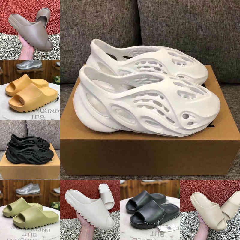 Wholesale 2021 New Kanyes Wests Slipper Men Women Slide Bone Earth Brown Desert Sand Slide Resin Fashion Shoes Sandals Foam Runner Trainers Size 36-45 F15, G205
Wholesale 2021 New Kanyes Wests Slipper Men Women Slide Bone Earth Brown Desert Sand Slide Resin Fashion Shoes Sandals Foam Runner Trainers Size 36-45 F15, G205