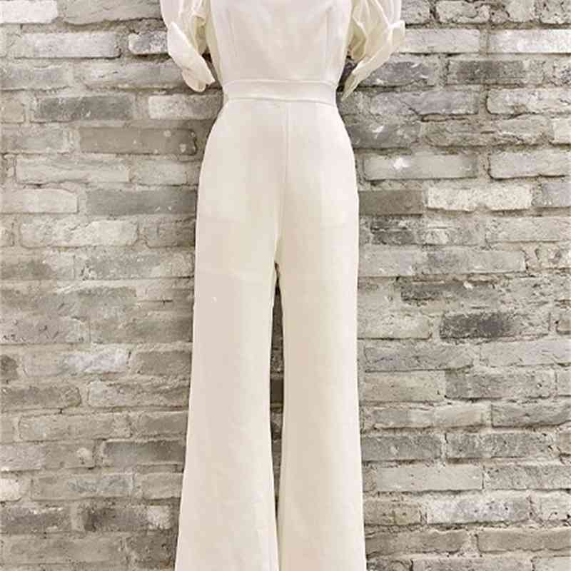 Sexy Women V-Neck Puff Sleeve Bow Jumpsuits Ladies Overalls Elegant Fashion OL High Waist Slim White Rompers 210519