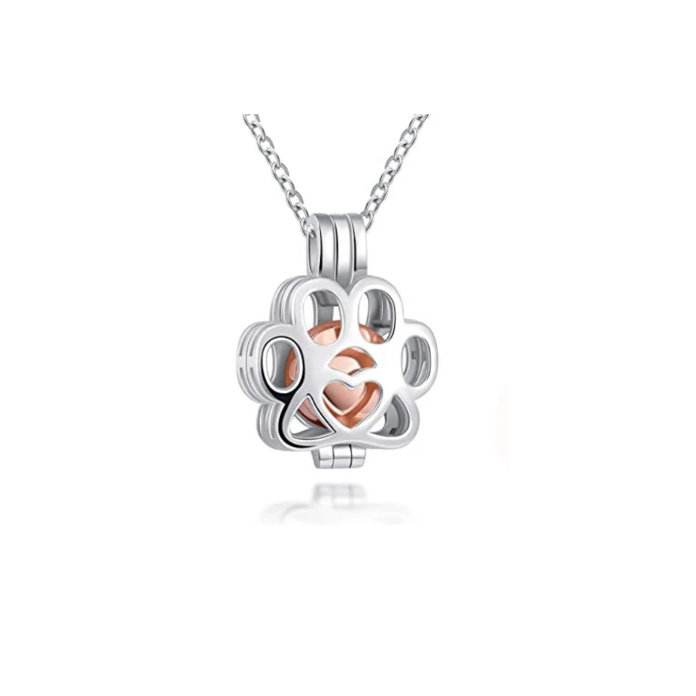 Wholesale silver hollow cat's paw shape cremation pendant, Openable ashes pendant necklace, put pet,ashes or hair as a souvenir
Wholesale silver hollow cat's paw shape cremation pendant, Openable ashes pendant necklace, put pet,ashes or hair as a souvenir