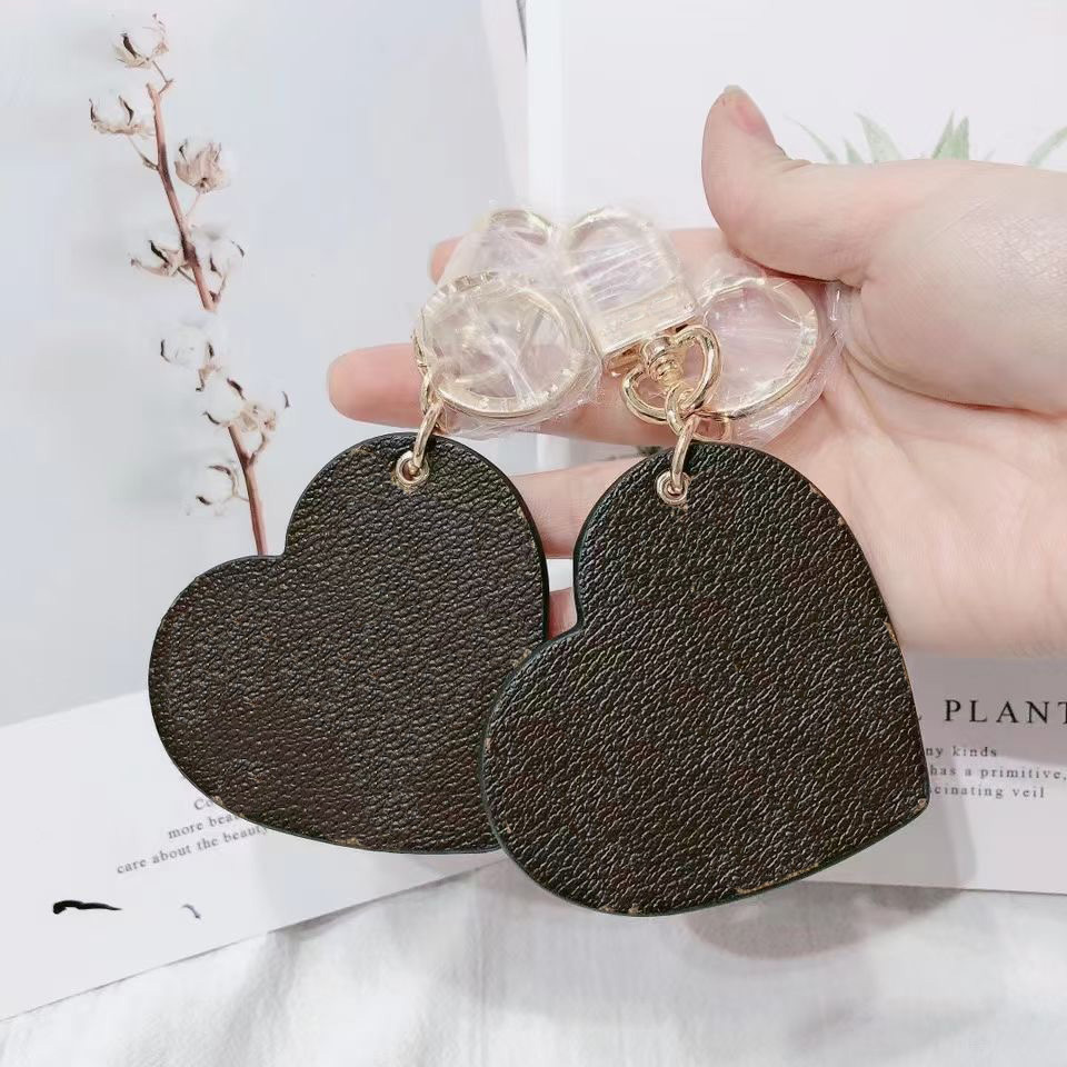 2021 Men Women Bags Pendant Accessories Luxury Key Buckle heart Car Keychain Handmade Designer L Leather Keychains
2021 Men Women Bags Pendant Accessories Luxury Key Buckle heart Car Keychain Handmade Designer L Leather Keychains