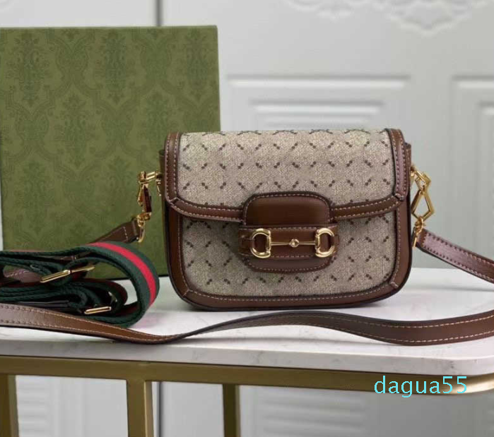 Petite Mini Horsebit The 1955 Versions of Cross body Bag Beige Canvas Two Straps Tonal Leather/Green And Red Nylon Shoulder Strap 2 Waist, Brown
Petite Mini Horsebit The 1955 Versions of Cross body Bag Beige Canvas Two Straps Tonal Leather/Green And Red Nylon Shoulder Strap 2 Waist, Brown