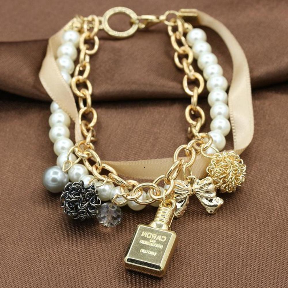Hand catenary Ladies Bracelet elegant perfume bottle string pearl bow knot multi bracelet E009, Golden;silver
Hand catenary Ladies Bracelet elegant perfume bottle string pearl bow knot multi bracelet E009, Golden;silver