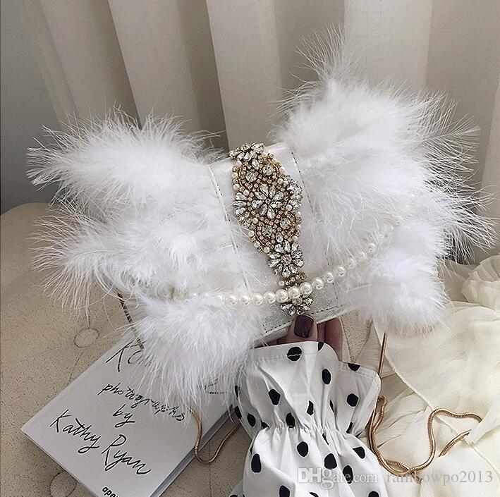 Factory wholesale women handbag hand sewn Turkey hair chain bag sweet lovely diamond fur bags pearl decoration diamonds Dinner handbags 
Factory wholesale women handbag hand sewn Turkey hair chain bag sweet lovely diamond fur bags pearl decoration diamonds Dinner handbags