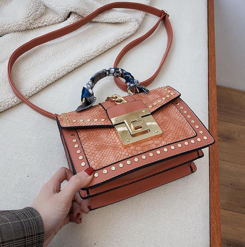 Factory wholesale women handbag scarves decorated womens shoulder bag elegant crocodile leather handbags personality rivet lock fashion bags
Factory wholesale women handbag scarves decorated womens shoulder bag elegant crocodile leather handbags personality rivet lock fashion bags