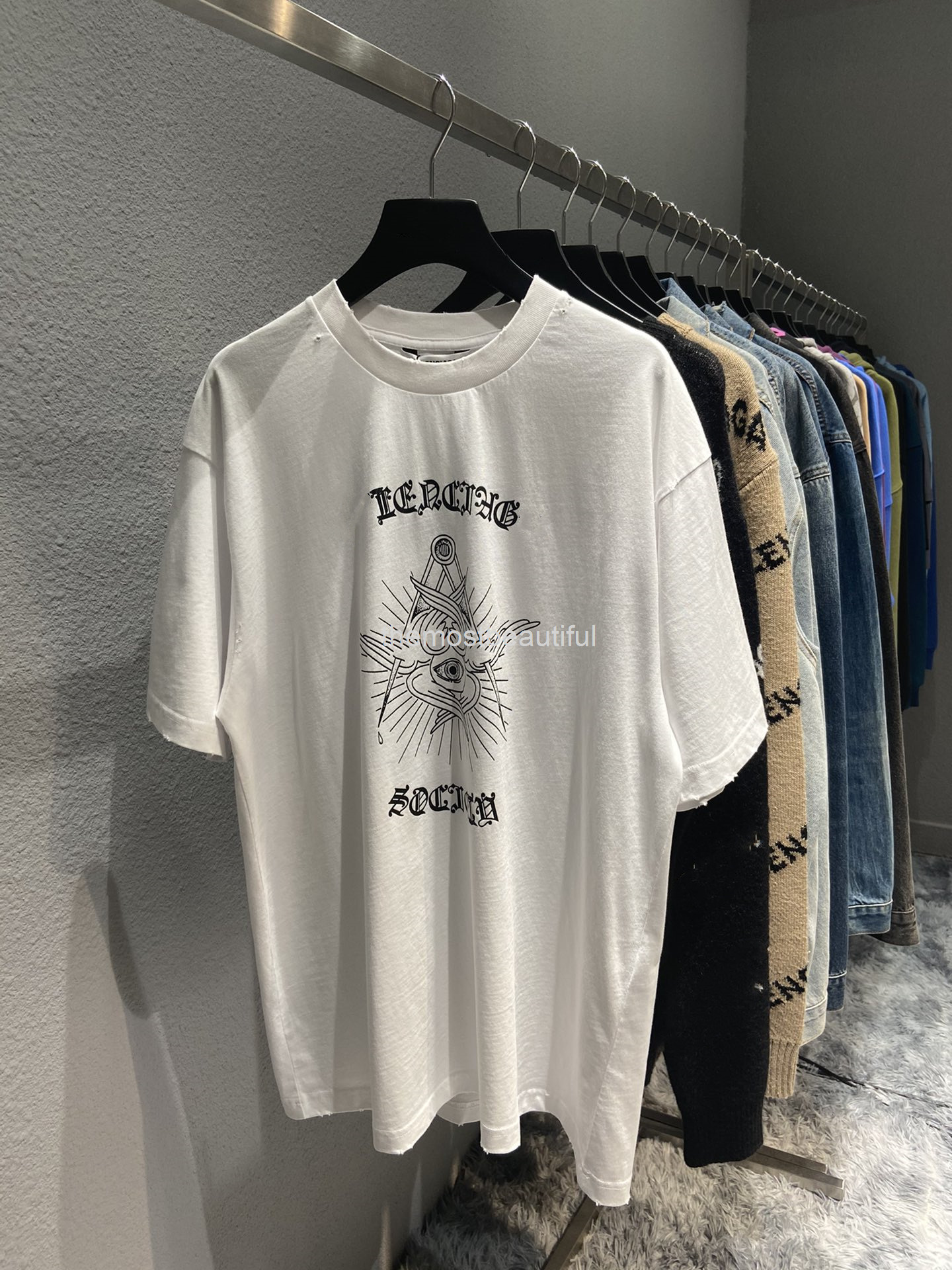 Women's T-Shirt Spring and summer high version b family angel eye Sanskrit print Pullover round neck loose casual men's women's same T-shirt short, 2# packing bag
Women's T-Shirt Spring and summer high version b family angel eye Sanskrit print Pullover round neck loose casual men's women's same T-shirt short, 2# packing bag