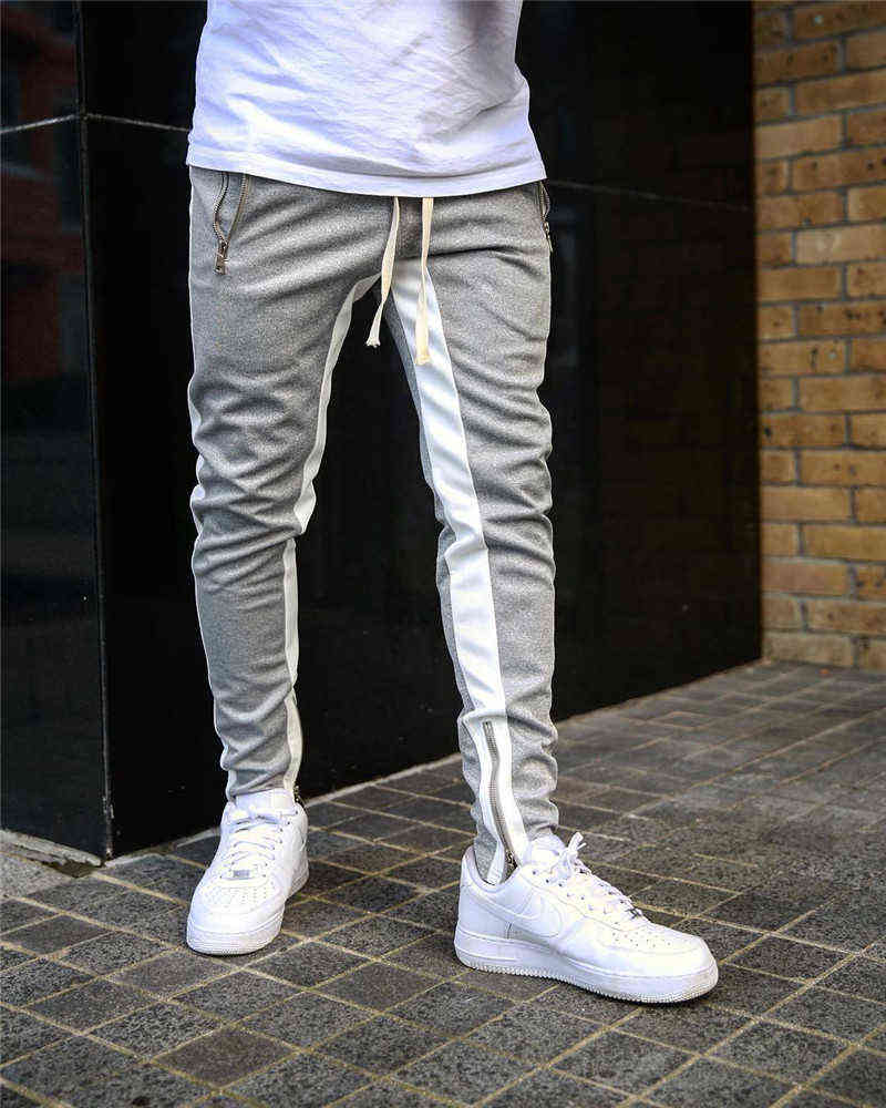 Mens Joggers Casual Pants Fitness Men Sportswear Tracksuit Bottoms Skinny Sweatpants Trousers Black Gyms Jogger Track Pants 211112