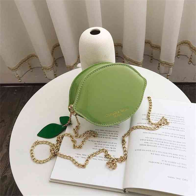New ins Korean version fresh lemon shape chain small fashion creative bright lacquer leather women's bag, Yellow
New ins Korean version fresh lemon shape chain small fashion creative bright lacquer leather women's bag, Yellow
