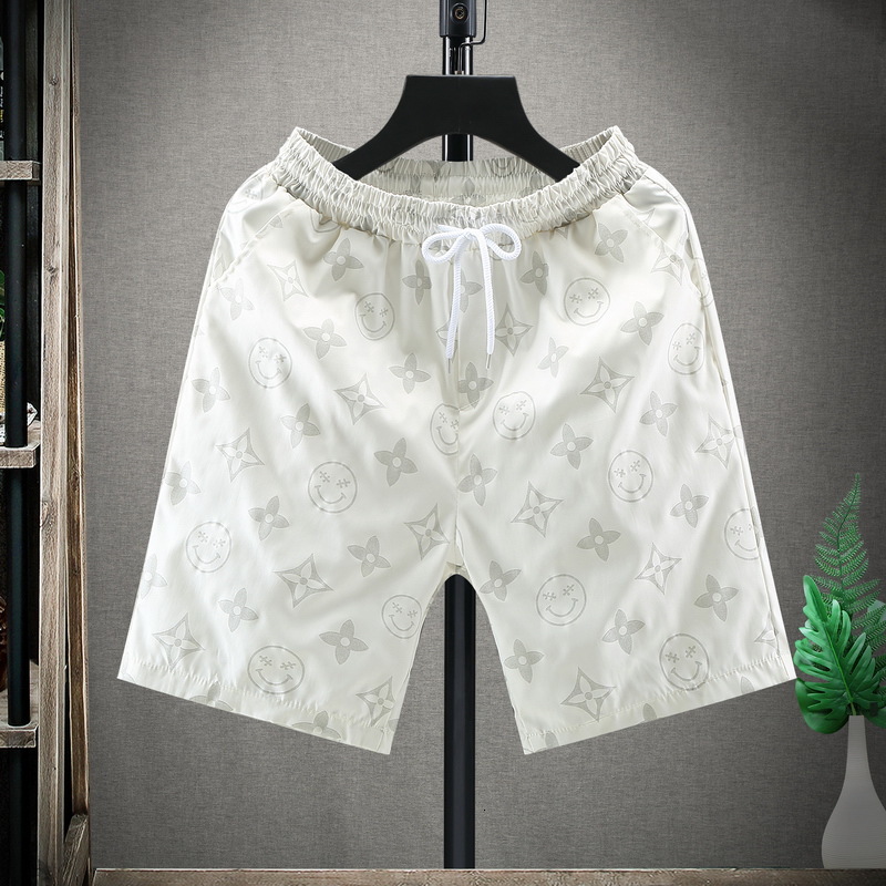 Mode Shorts Summer Hommes Jeune Beau Sports Loisirs Loisirs Pantalons de plage Libres Tube Straight Tube Capris