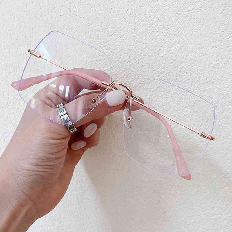 New Cutting Rimless Anti-blue Glasses For Women Vintage Alloy Oversized Square Computer Eyewear Female Print Ultralight Shades 210323
New Cutting Rimless Anti-blue Glasses For Women Vintage Alloy Oversized Square Computer Eyewear Female Print Ultralight Shades 210323