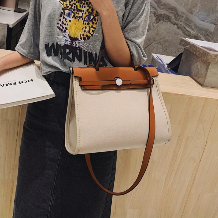 Factory wholesale women bag canvas womens handbag large retro leather handbags elegant stitching contrast color womenes shoulder bags
Factory wholesale women bag canvas womens handbag large retro leather handbags elegant stitching contrast color womenes shoulder bags