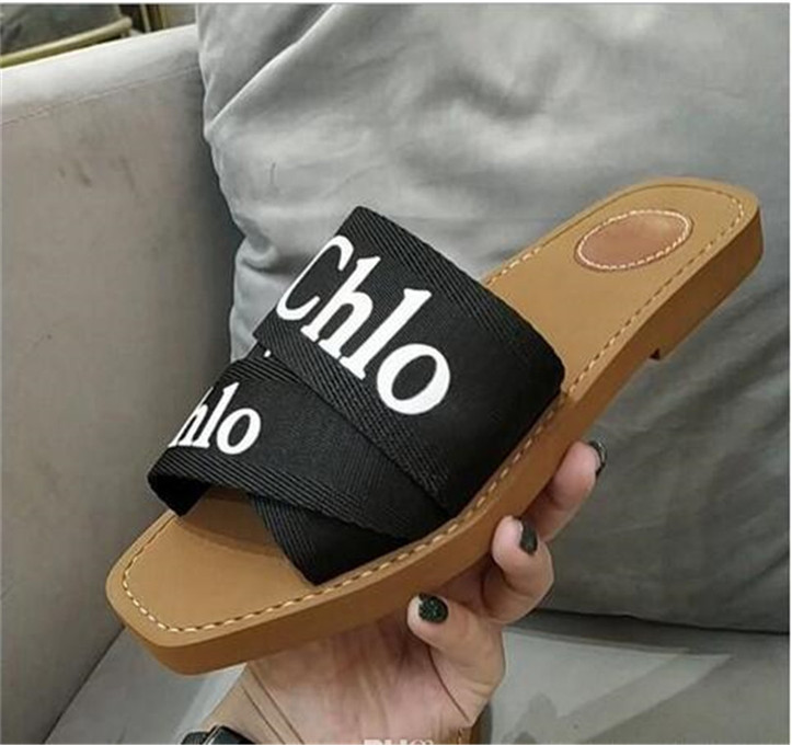 002 2021 Newest Branded Women Woody Mules Fflat Slipper Deisgner Lady Lettering Fabric Outdoor Leather Sole Slide Sandal, White
002 2021 Newest Branded Women Woody Mules Fflat Slipper Deisgner Lady Lettering Fabric Outdoor Leather Sole Slide Sandal, White