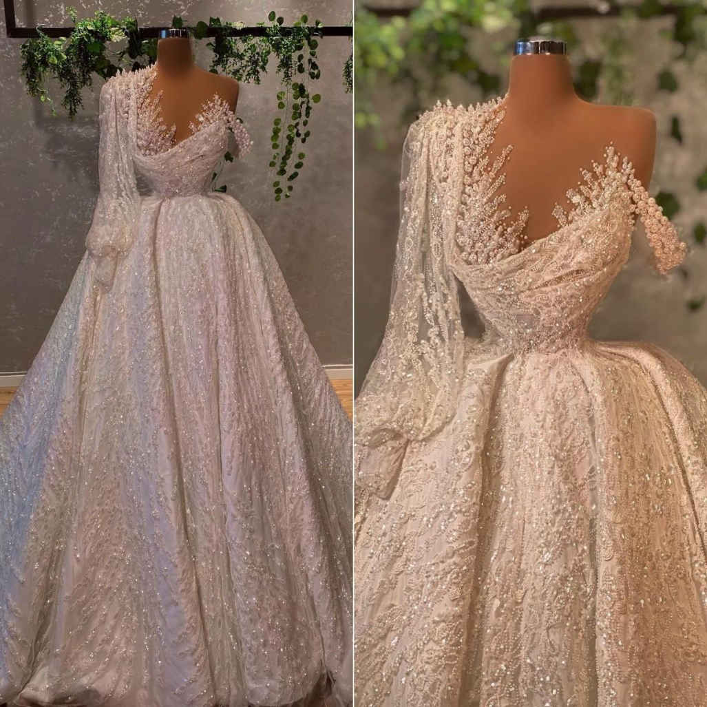 2022 Luxury Arabic Plus Size Lace Wedding Dresses Bridal Gowns Beading Long Sleeve Crystal One Shoulder Sequined vestidos de novia, White
2022 Luxury Arabic Plus Size Lace Wedding Dresses Bridal Gowns Beading Long Sleeve Crystal One Shoulder Sequined vestidos de novia, White