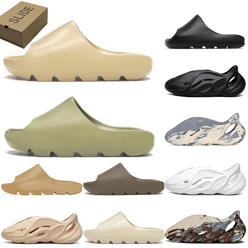 With Box 2021 Slides Slippers Sandals Men Women Beige Mineral Blue Desert Sand Earth Brown Bone White Enflame Orange Foam Runner Slide Outdoor Slipper Size 35-47, D24 kid 32-35 (2)
With Box 2021 Slides Slippers Sandals Men Women Beige Mineral Blue Desert Sand Earth Brown Bone White Enflame Orange Foam Runner Slide Outdoor Slipper Size 35-47, D24 kid 32-35 (2)