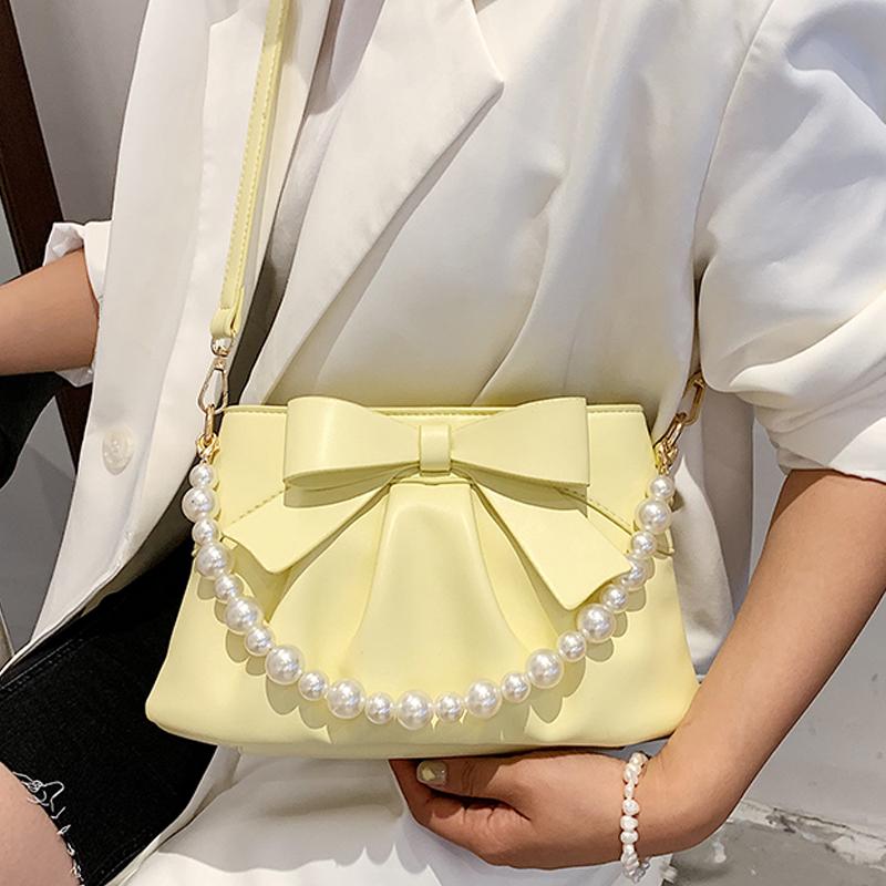 Waist Bags Pearl Handle PU Leather Bow Crossbody Shoulder Bag For Women 2021 Fashion Casual Lady Purses And Handbag High Quality
Waist Bags Pearl Handle PU Leather Bow Crossbody Shoulder Bag For Women 2021 Fashion Casual Lady Purses And Handbag High Quality