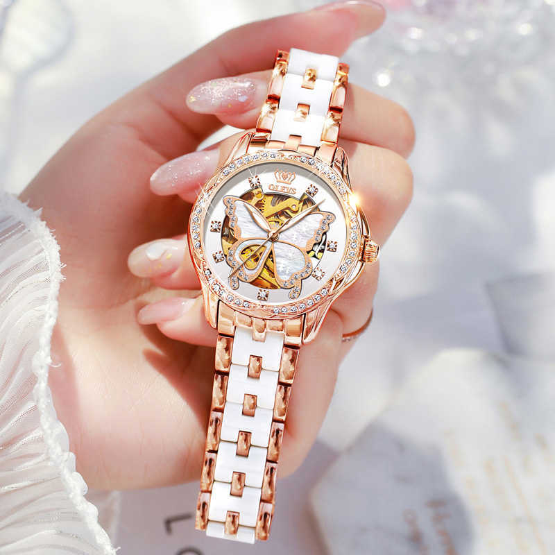 OLEVS Mechanical Women Watch Fashion Switzerland Luxury Brand Ladies WristWatch Automatic Ceramic Hollow Design montre femme 210616, Red leather gift
OLEVS Mechanical Women Watch Fashion Switzerland Luxury Brand Ladies WristWatch Automatic Ceramic Hollow Design montre femme 210616, Red leather gift