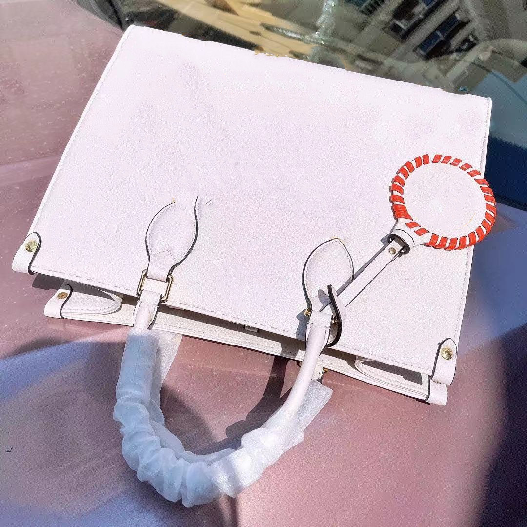 Classic 2021 atmosphere style luxury fashion tote bags female woman mini high quality tourism street design bag High-end
Classic 2021 atmosphere style luxury fashion tote bags female woman mini high quality tourism street design bag High-end
