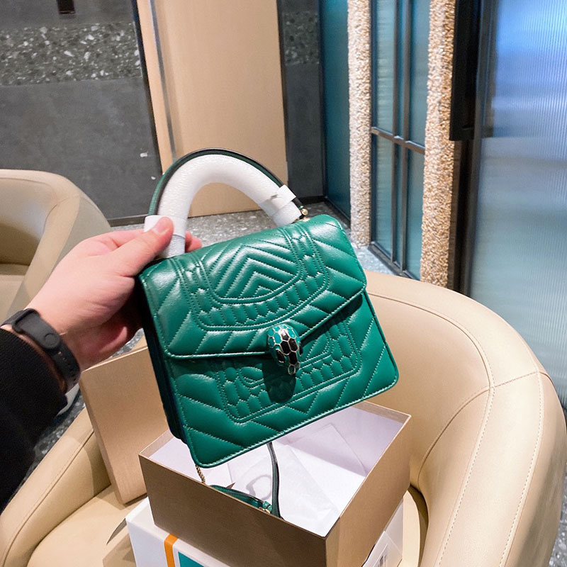 Green snake head handbag famous designer brand shoulder bag woman leather messenger bag with box
Green snake head handbag famous designer brand shoulder bag woman leather messenger bag with box