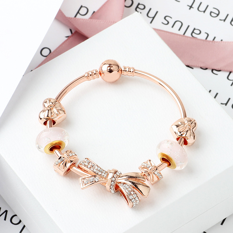 Strands fashion rose gold shining bow bracelet 18-20cm love charm glass bead jewelry wholesale
Strands fashion rose gold shining bow bracelet 18-20cm love charm glass bead jewelry wholesale