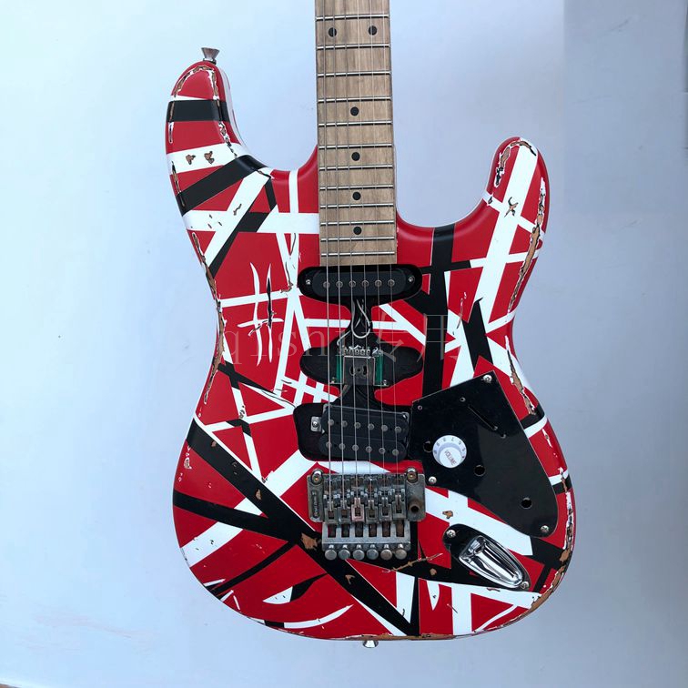 Electric Guitar Edward Eddie Van Halen Black White Stripe Red Heavy Relic Maple Neck, Floyd Rose Tremolo & Locking Nut
Electric Guitar Edward Eddie Van Halen Black White Stripe Red Heavy Relic Maple Neck, Floyd Rose Tremolo & Locking Nut