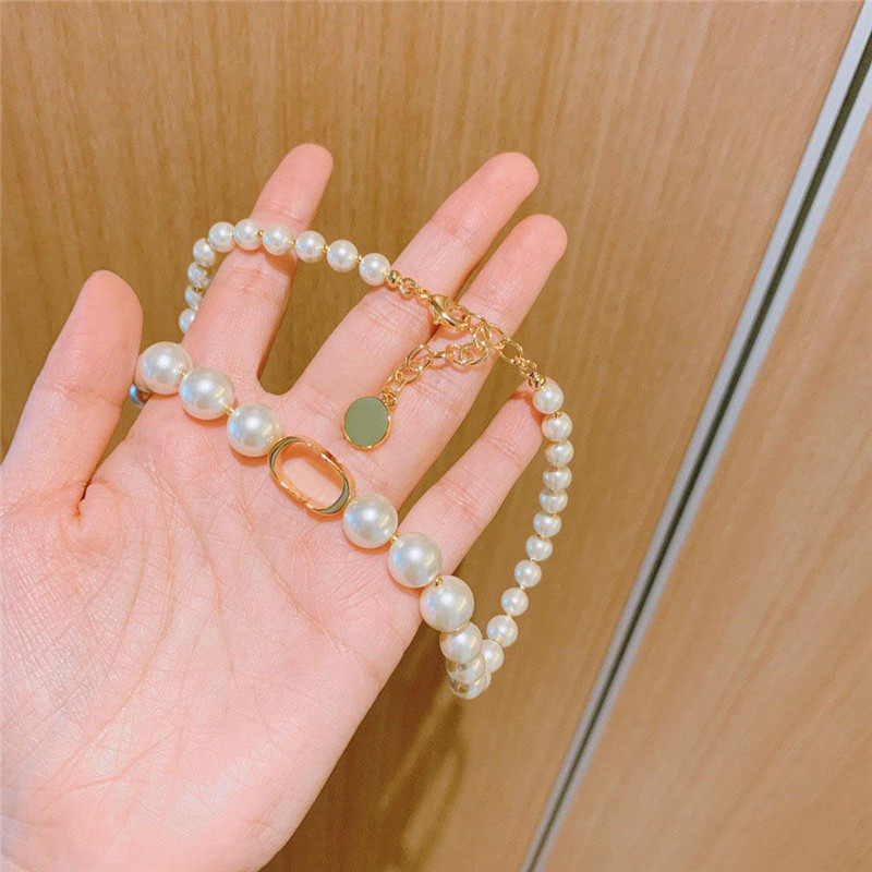 Pearl Necklace fashion women personality designers love jewelry luxurys gold Party unique elegant Pendant Necklaces With box
Pearl Necklace fashion women personality designers love jewelry luxurys gold Party unique elegant Pendant Necklaces With box