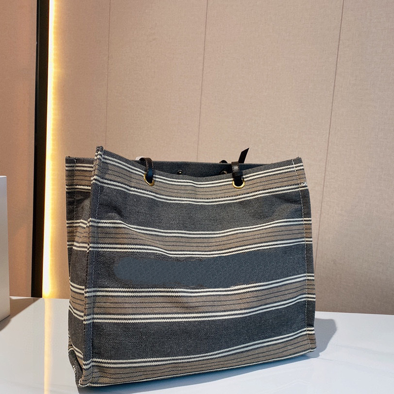 5A+ Tote Bag Designer Handbag Shoulder Bags Luxury Totes Handbags Canvas Stripes Artwork High-Quality Fashion Brand With original box size 40x33cm
5A+ Tote Bag Designer Handbag Shoulder Bags Luxury Totes Handbags Canvas Stripes Artwork High-Quality Fashion Brand With original box size 40x33cm