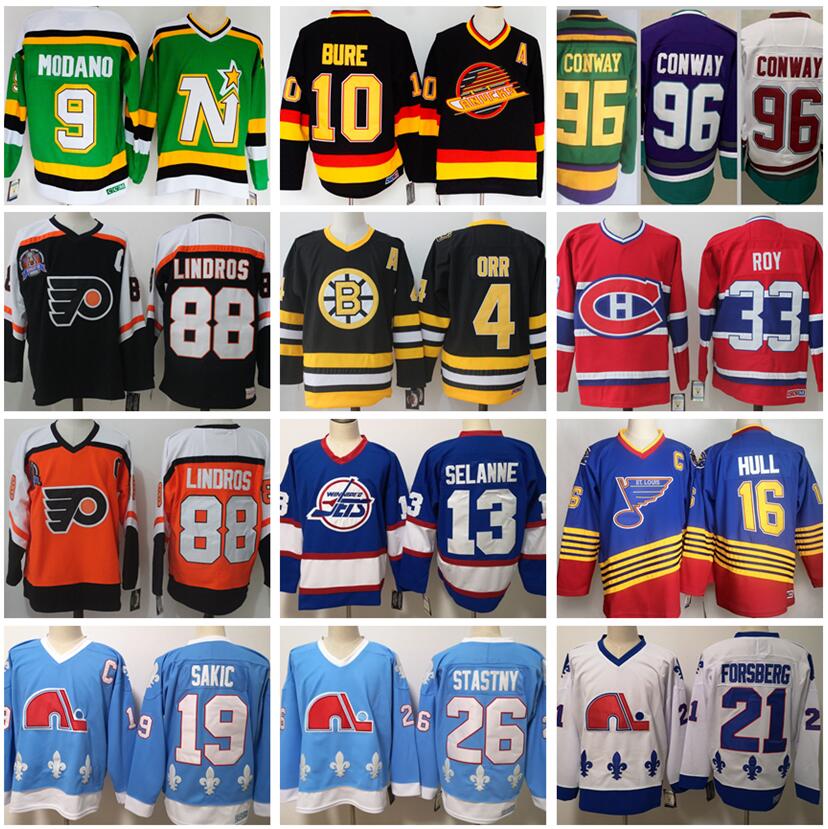 Vintage Hockey Jersey Charlie Conway Pavel Bure Mike Modano Eric Lindros Bobby Orr Patrick Roy Joe Sakic Peter Forsberg Stastny Teemu Selanne Ron Francis Stitched, Photo b
Vintage Hockey Jersey Charlie Conway Pavel Bure Mike Modano Eric Lindros Bobby Orr Patrick Roy Joe Sakic Peter Forsberg Stastny Teemu Selanne Ron Francis Stitched, Photo b