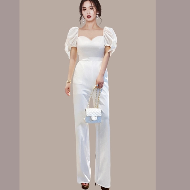 Sexy Women V-Neck Puff Sleeve Bow Jumpsuits Ladies Overalls Elegant Fashion OL High Waist Slim White Rompers 210519