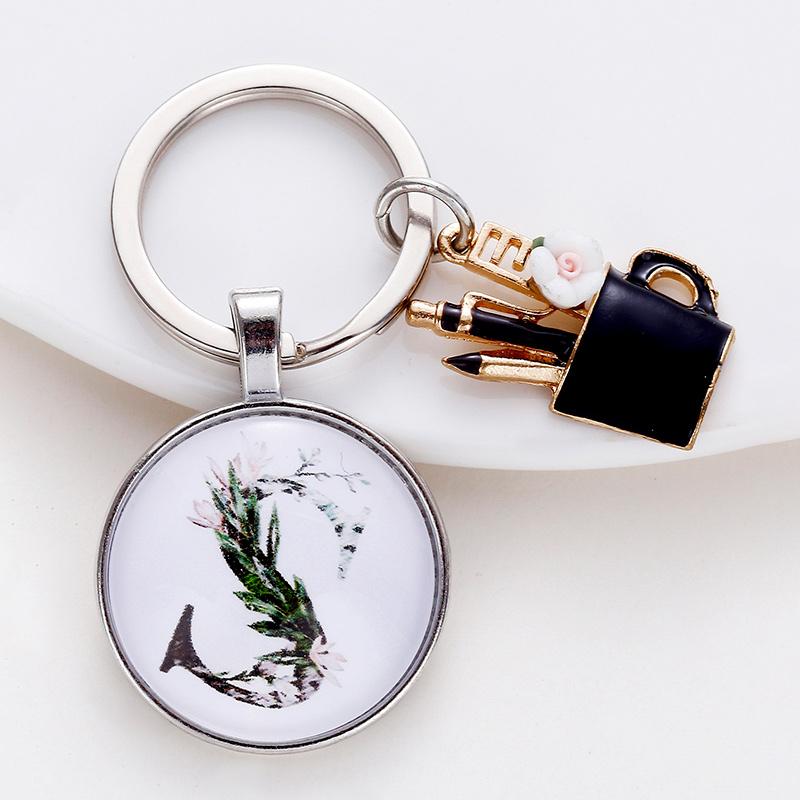 Keychains Charm Enamel Pen Holder Teacher's Day Gift Keychain, Convex Glass Round A-Z Pendant Keychain Thank You Teacher For The Light 
Keychains Charm Enamel Pen Holder Teacher's Day Gift Keychain, Convex Glass Round A-Z Pendant Keychain Thank You Teacher For The Light