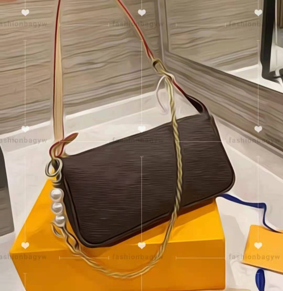 2021 Designer bags Wallet Shoulder Bag Crossbody Ladies shoulders back classic print fashion pearl straps design Baguette Mobile phone lipst
2021 Designer bags Wallet Shoulder Bag Crossbody Ladies shoulders back classic print fashion pearl straps design Baguette Mobile phone lipst