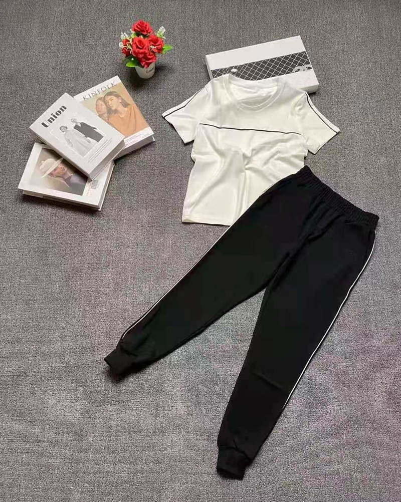 Fashion designer women's two-piece Pants, high-quality fabric breathable T-shirt, leisure atmosphere sports pant, the cheapes set in whole net, White
Fashion designer women's two-piece Pants, high-quality fabric breathable T-shirt, leisure atmosphere sports pant, the cheapes set in whole net, White