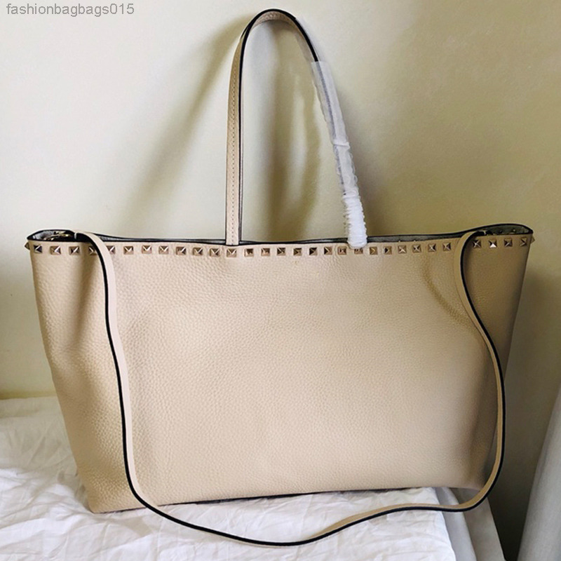 Large Stud Shopping Bag Tote Women Handbags Rivet Shoulder Bags Grain Calfskin Leather Fashion Letter Magnetic Closure Interior Zipper A-001
Large Stud Shopping Bag Tote Women Handbags Rivet Shoulder Bags Grain Calfskin Leather Fashion Letter Magnetic Closure Interior Zipper A-001