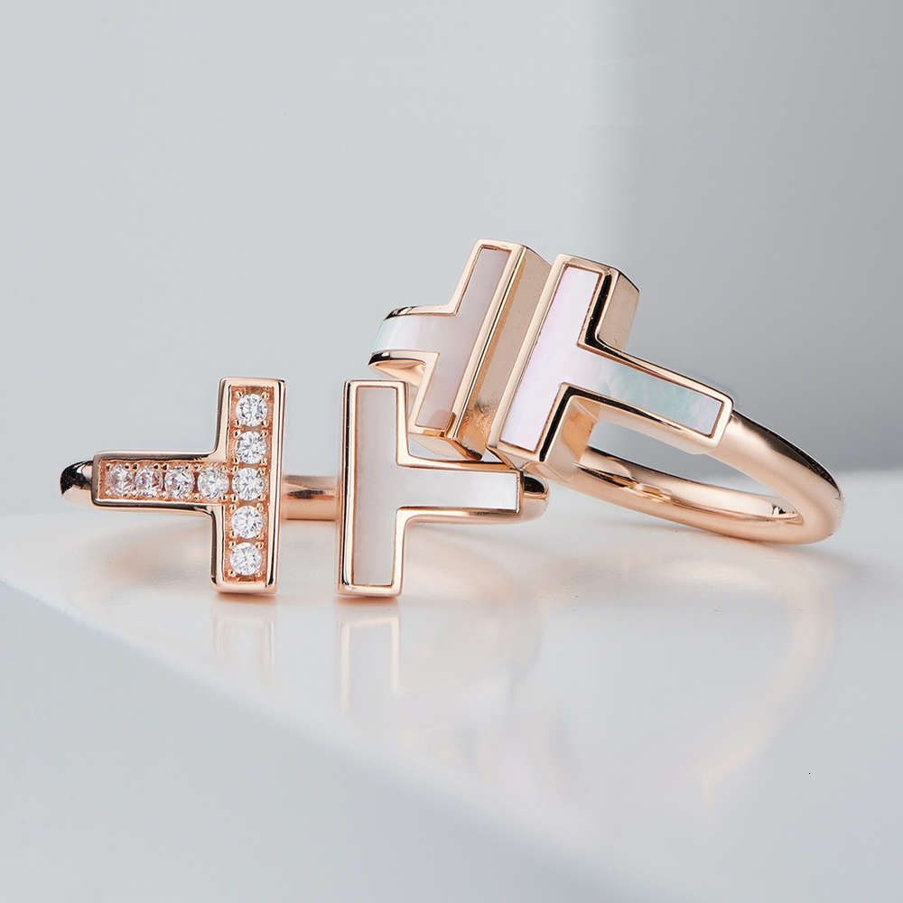 T family double white shell ring 925 Sterling Silver Plated 18K gold open mother inlaid with diamond -shaped
T family double white shell ring 925 Sterling Silver Plated 18K gold open mother inlaid with diamond -shaped