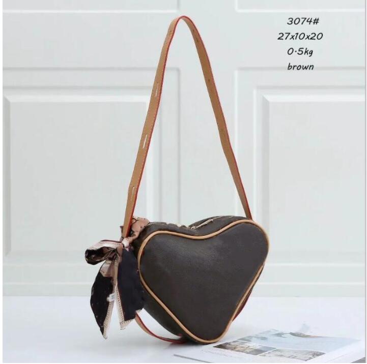 Famous fashion love ladies crossbody heart-shaped bag wallet handbag shoulder coin purse
Famous fashion love ladies crossbody heart-shaped bag wallet handbag shoulder coin purse