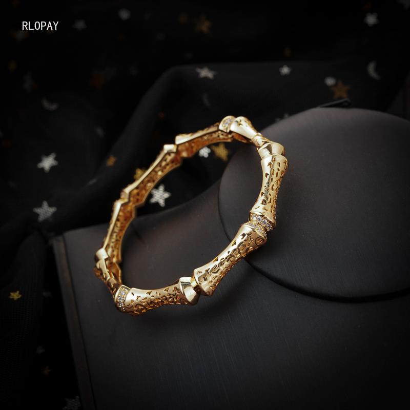 Bangle Top Quality Charm Bracelet Bangles Gold Hollow Flower Bamboo Shape Side Open Cuff Bracelets Copper Bridal Jewelry
Bangle Top Quality Charm Bracelet Bangles Gold Hollow Flower Bamboo Shape Side Open Cuff Bracelets Copper Bridal Jewelry