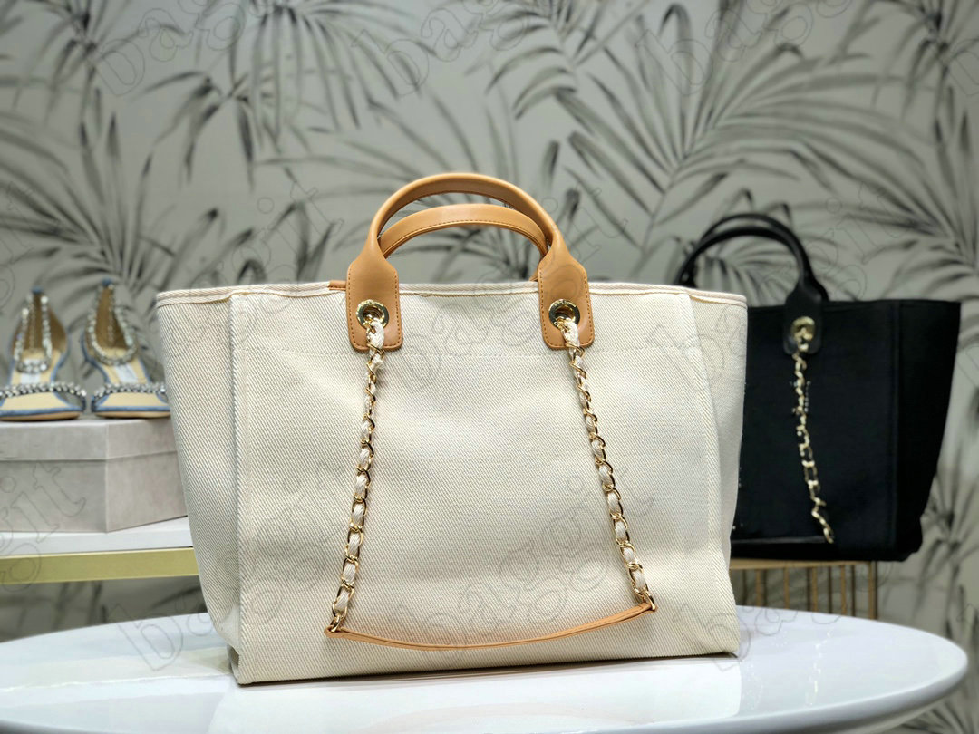 Classic Deauville Pearl Ecru Large Ecru Cream Beige Canvas Tote Designer Shopping Bag Leather Chains Handbag Brand Luxurys Womens bags Overs
Classic Deauville Pearl Ecru Large Ecru Cream Beige Canvas Tote Designer Shopping Bag Leather Chains Handbag Brand Luxurys Womens bags Overs