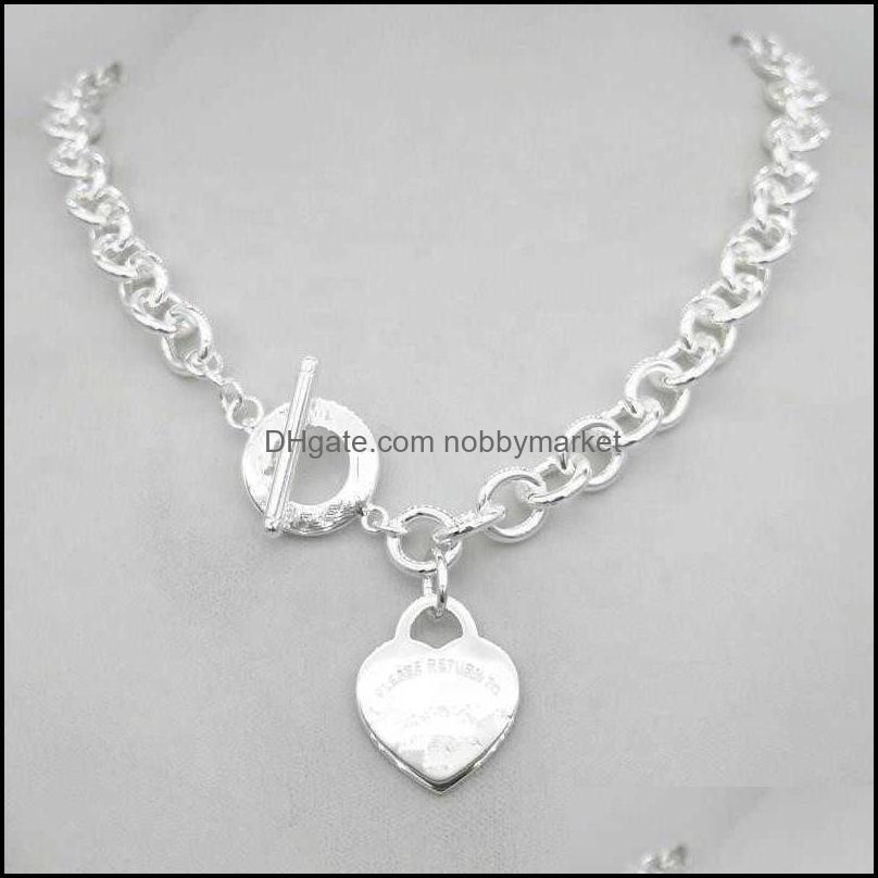 Pendant Necklaces & Pendants Jewelry Design Womens Sier Tf Style Necklace Chain S925 Sterling Key Heart Love Egg Brand Charm Nec H0918 Drop
Pendant Necklaces & Pendants Jewelry Design Womens Sier Tf Style Necklace Chain S925 Sterling Key Heart Love Egg Brand Charm Nec H0918 Drop